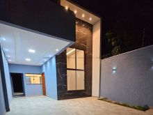 Casa térrea com pé direito duplo em toda a casa