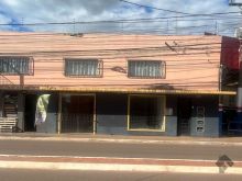Ao lado do supermercado Pires