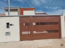 Casa com dois quartos mais uma suíte