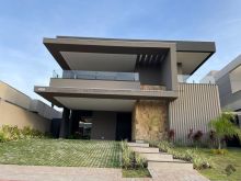 Quatro suítes e elevador no Alphaville I