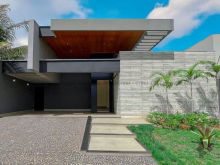 Casa moderna com gourmet e piscina com cascata