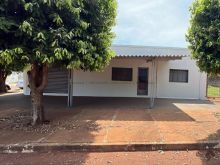 Casa térrea e salão comercial